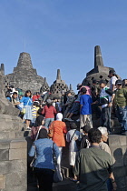 Indonesia, Java, Borobudur, Crowded steps leading up to the main stupa on the top level of the monument.