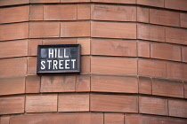 Ireland, North, Belfast, Cathedral Quarter, Sign on building in Hill Street.