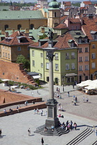 Poland, Warsaw, Old Town, Plac Zamkowy, King Sigismund III Column with crowds of tourists seen from St Anne's tower.