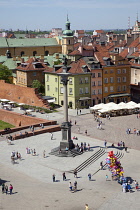 Poland, Warsaw, Old Town, Plac Zamkowy, King Sigismund III Column with crowds of tourists seen from St Anne's tower.