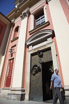 Poland, Warsaw, Old Town, Swietojanska, Entrance to the Jesuit Church of the Gracious Mother of God.