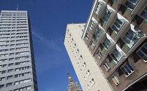 Poland, Warsaw, Chielna, Modern architecture with the Palace of Culture and Science clock in the background