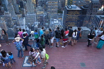 USA, New York State, New York City, Manhattan, Crowds of tourists viewing the skyline seen from top of the Rockefeller Center.