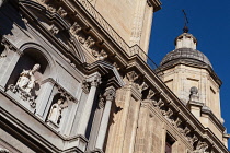 Spain, Andalucia, Granada, Sculpture above the doorway to Iglesia del Sagrario .