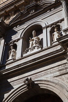 Spain, Andalucia, Granada, Sculpture above the doorway to Iglesia del Sagrario.