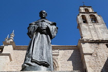 Spain, Andalucia, Granada, Statue of Fray Luis de Granada in front of Iglesia de Santo Domingo.