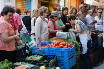 Spain, Andalucia, Granada, Fruit and vegetable stall on Calle San Agustin.