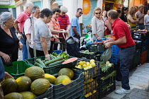 Spain, Andalucia, Granada, Fruit and vegetable stall on Calle San Agustin.