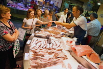 Spain, Andalucia, Seville, Fish counter in the market at Metropol Parasol.