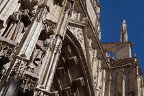 Spain, Andalucia, Seville, Carved figures on the Cathedral Door of the Assumption.