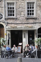 Scotland, Edinburgh, Cafe culture along the Royal Mile.