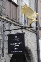 Scotland, Edinburgh, Gladstone's Land sign.