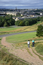 Scotland, Edinburgh, Holyrood Park, views towards city centre from Holyrood Park with walkers.