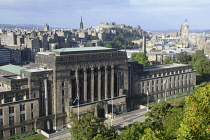 Scotland, Edinburgh, Calton Hill, view onto St Andrew's House home to the Scottish Executive and across the Old Town to Edinburgh Castle.