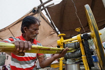 India, Rajasthan, Pushkar, Sugar cane vendor.