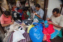 India, Bengal, Kolkata, Darning shop in Sadar Bazaar, Kolkata.