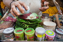 India, Bengal, Kolkata, Pan Vendor in Malik Ghat Flower Market, Kolkata.