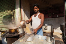 India, Bengal, Kolkata, Chai vendor in the Sadar Bazaar, Kolkata.