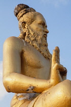 India, Tamil Nadu, Mahabalipuram, Statue of Thiruvalluvar on the beach at Mahabalipuram.