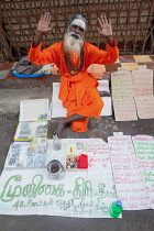 India, Tamil Nadu, Madurai, Saddhu at the Sri Meenakshi Temple in Madurai.