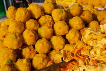 India, Karnataka, Bijapur, Laddoos, Indian sweets, for sale in the market at Bijapur.