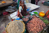 India, Karnataka, Bijapur, Vegetable vendor in Bijapur market.