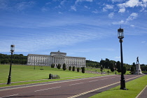 Ireland, North, Belfast, Stormont assembly building with statue of Lord Edward Carson in the foreground.