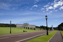 Ireland, North, Belfast, Stormont assembly building with statue of Lord Edward Carson in the foreground.