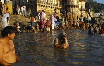 India, Uttar Pradesh, Varanasi, Crowds bathing and praying in the River Ganges.