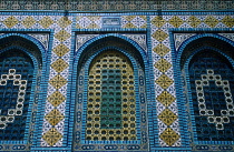 Israel, Jerusalem, Dome of the Rock detail of carved and decorated wall with arches.