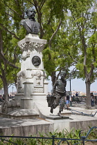 Portugal, Estremadura, Lisbon, Bairro Alto, Statue in Sao Pedro de Alcantara gardens.