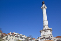 Portugal, Estremadura, Lisbon, Baixa, Praca Rossio with statue of King Pedro IV in the centre of the square.