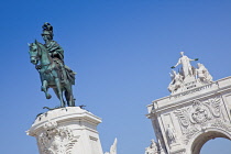 Portugal, Estremadura, Lisbon, Baixa, Praca do Comercio with equestrian statue of King Jose and Rua Augusta triumphal arch.