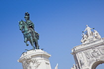 Portugal, Estremadura, Lisbon, Baixa, Praca do Comercio with equestrian statue of King Jose and Rua Augusta triumphal arch.