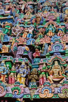 India, Tamil Nadu, Kumbakonam, Detail of the gopuram at the Adi Kumbeswarar temple.