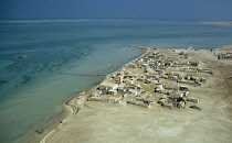 Qatar, Ruwais, Coastal town with the Gulf sea beyond.