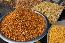 India, Uttar Pradesh, Lucknow, Display of namkeen and savoury snacks.