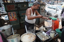 India, New Delhi, Chai vendor in the old city of Delhi.