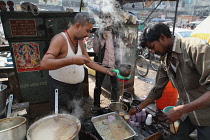 India, New Delhi, Chai vendor in the old city of Delhi.