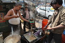 India, New Delhi, Chai vendor in the old city of Delhi.