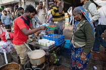 India, New Delhi, Chai vendor in the old city of Delhi.