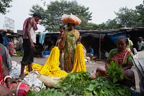 India, West Bengal, Kolkata, Malik Ghat flower market.