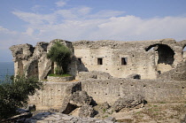 Italy, Lombardy, Lake Garda, Sirmione, Grotte di Catullo, Roman ruins of settlement with lake views.