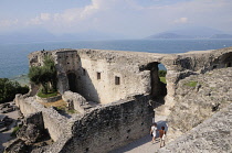 Italy, Lombardy, Lake Garda, Sirmione, Grotte di Catullo, Roman ruins of settlement with lake views.