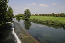 Italy, Lombardy, River Mincio, wier & river views at Goito.