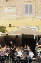 Italy, Lazio, Rome, Trastevere, Piazza di Santa Maria de Trastevere, cafes on the Piazza.