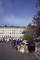 England, East Sussex, Hove, Overflowing bins during refuse collectors strike.