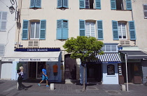 France, Provence-Alps, Cote d'Azur, Antibes, Exterior of shops in the old town.