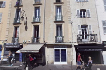 France, Provence-Alps, Cote d'Azur, Antibes, Exterior of shops in the old town.