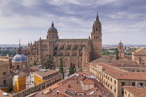 Spain, Castile and Leon, Salamanca, Cathedral of the Assumption of the Virgin Mary seen from the Scala Coeli of La Clerecia which is the former Real Colegio del Espíritu Santo of the Society of Jesus...